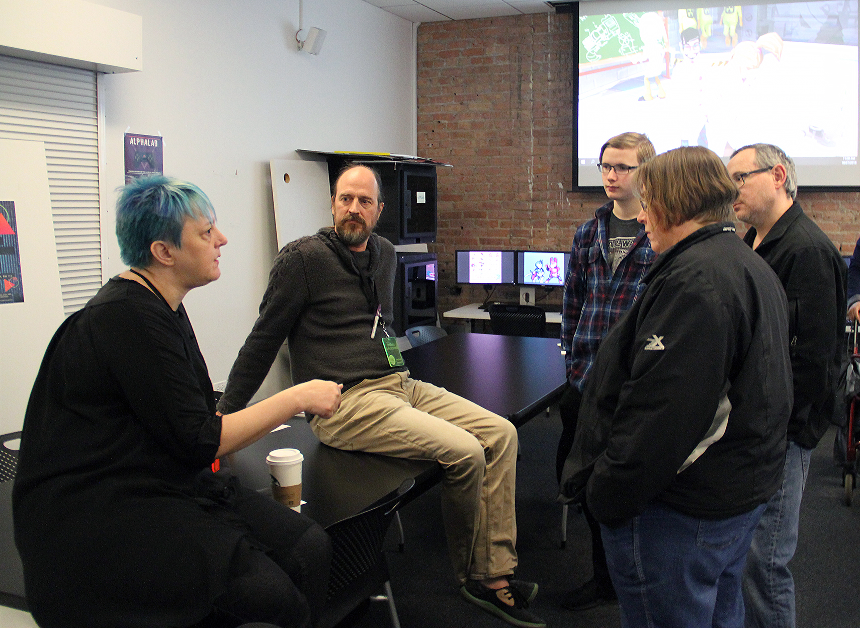 Faculty members and guests at IAM's open house